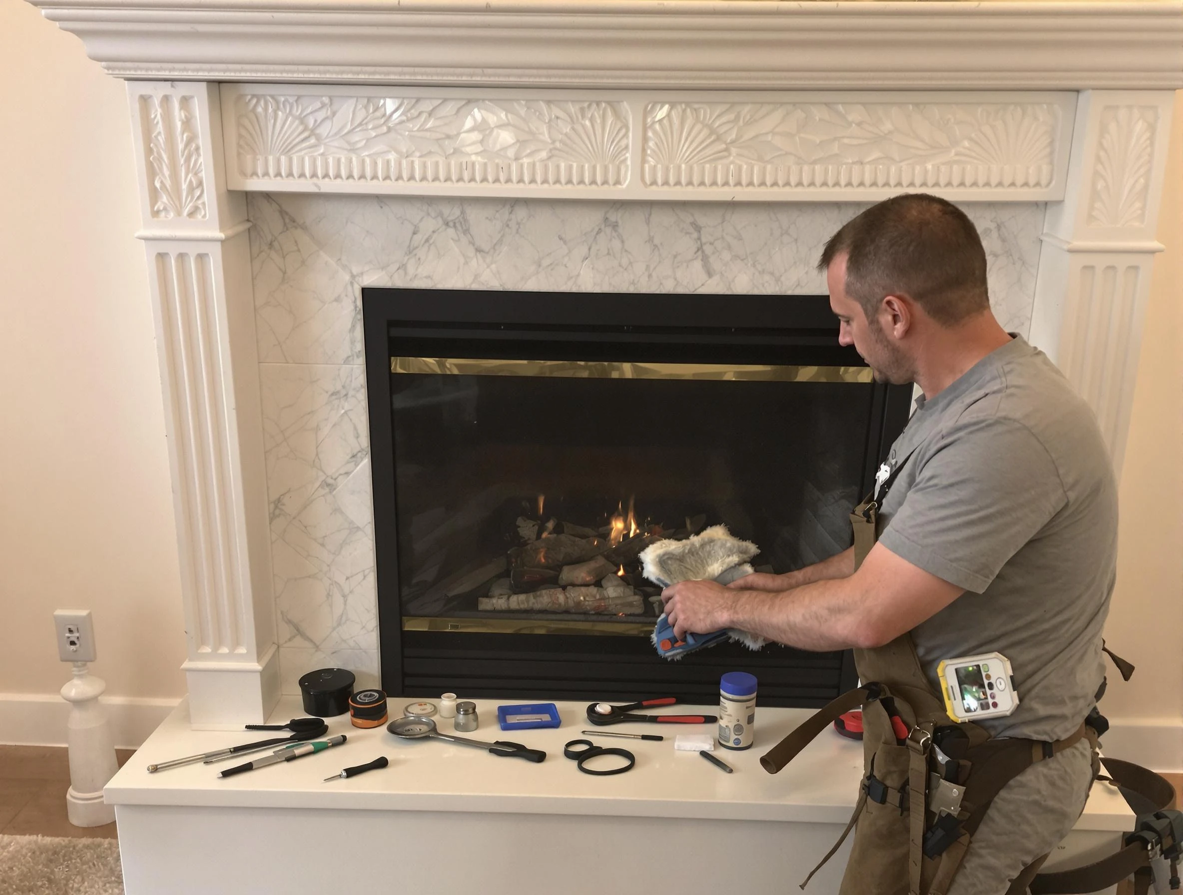 Munhall Chimney Sweep performing fireplace maintenance in Munhall, PA